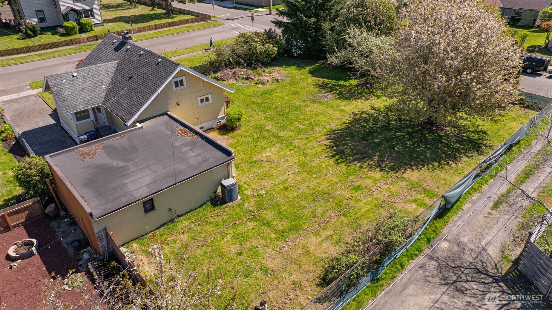 1320 4th Street Cosmopolis, WA 98537 - Photo 4 of 40 a aerial view of a house with a yard