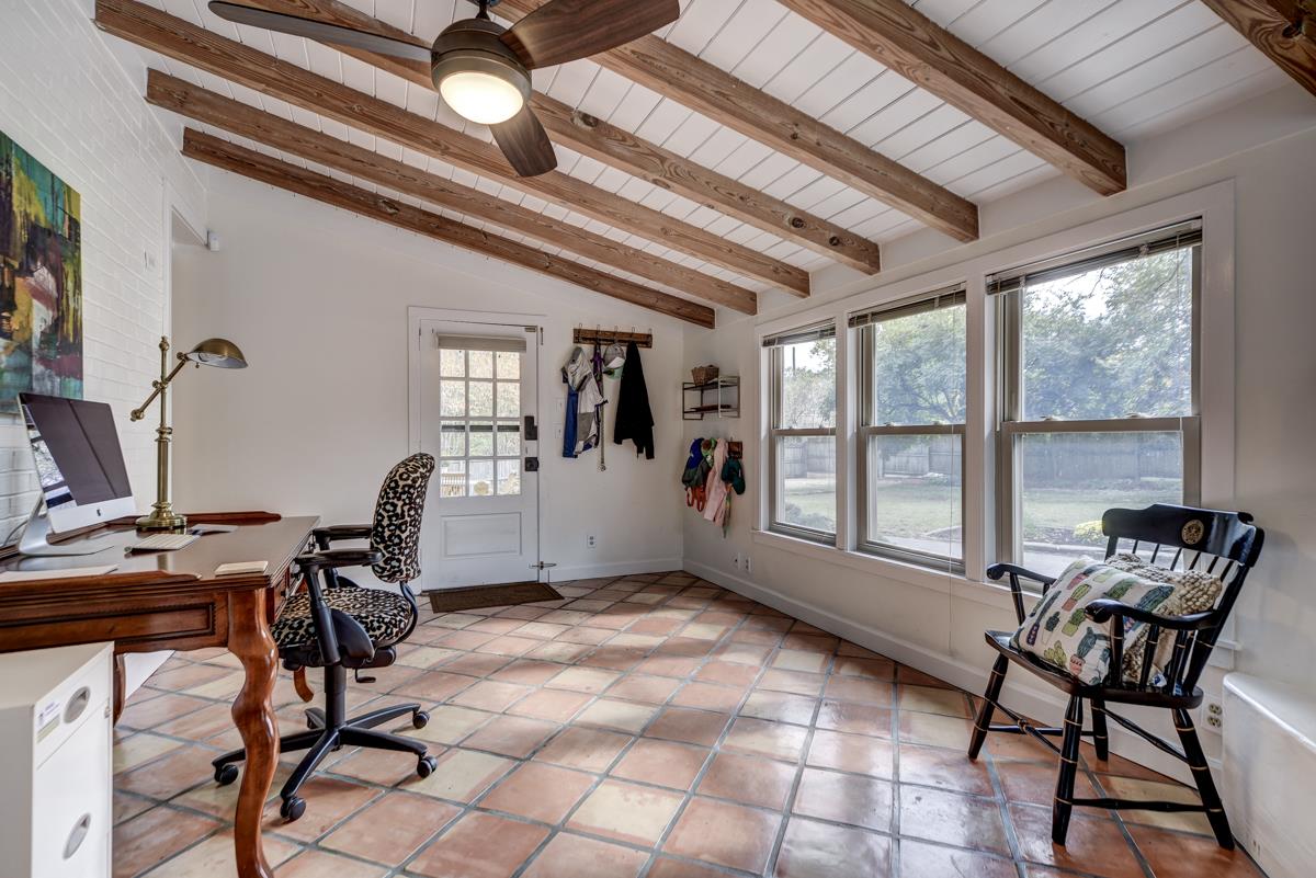 1132 Winding Way Road Nashville, TN 37216 - Photo 14 of 30 Amazing sunroom with wood beams, tongue and groove ceiling, and a mosaic tiled gas fireplace.