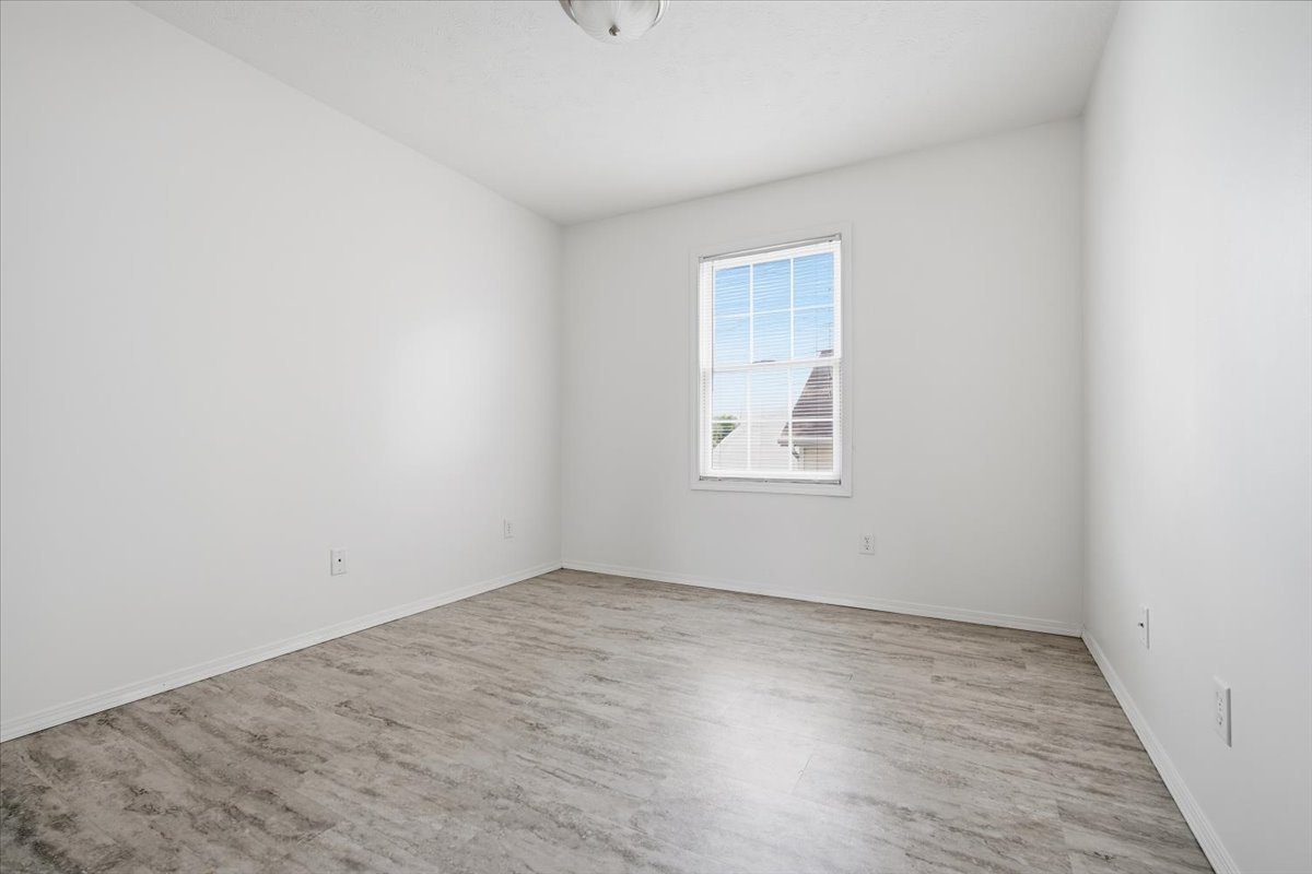 915 Teegan Street Normal, IL 61761 - Photo 16 of 33 an empty room with a workbench