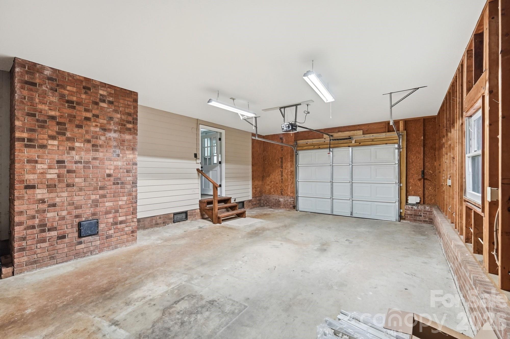 1235 Winecoff School Road Concord, NC 28027 - Photo 21 of 27 an empty room with windows