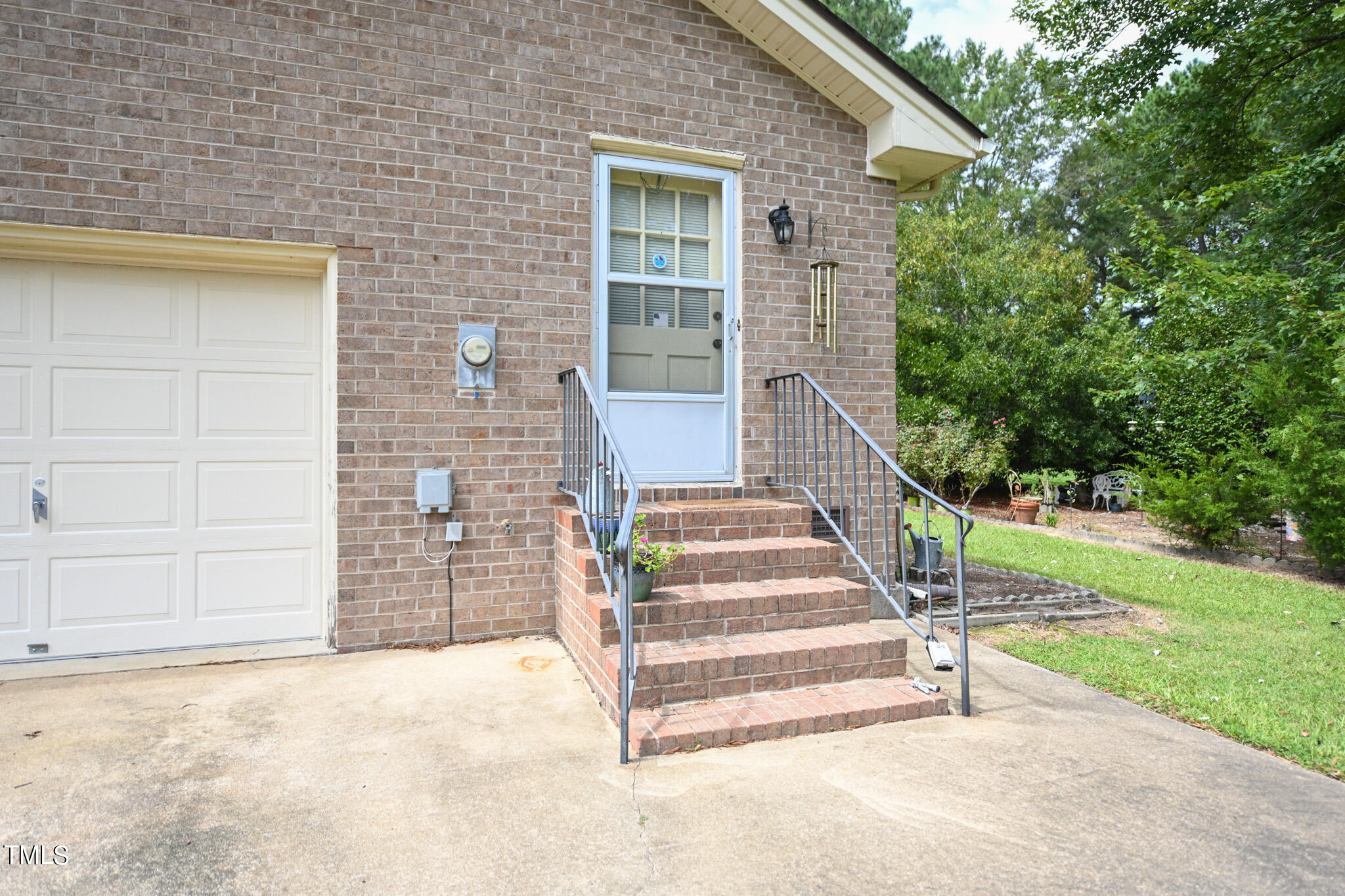 7254 Springfield School Road Lucama, NC 27851 - Photo 54 of 54 a view of a door with a house