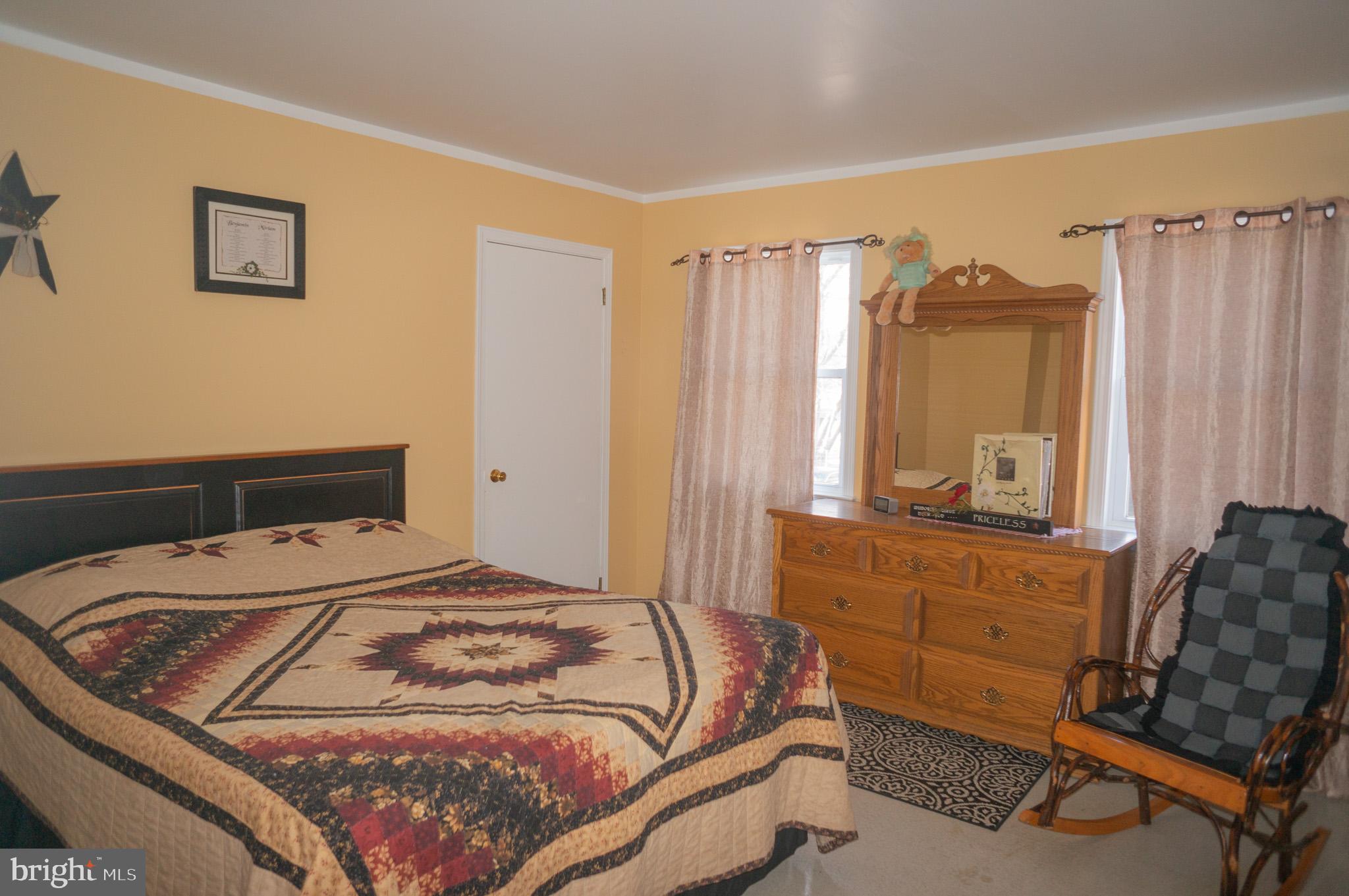 788 Buck Road New Providence, PA 17560 - Photo 15 of 70 a bedroom with a bed and a dresser