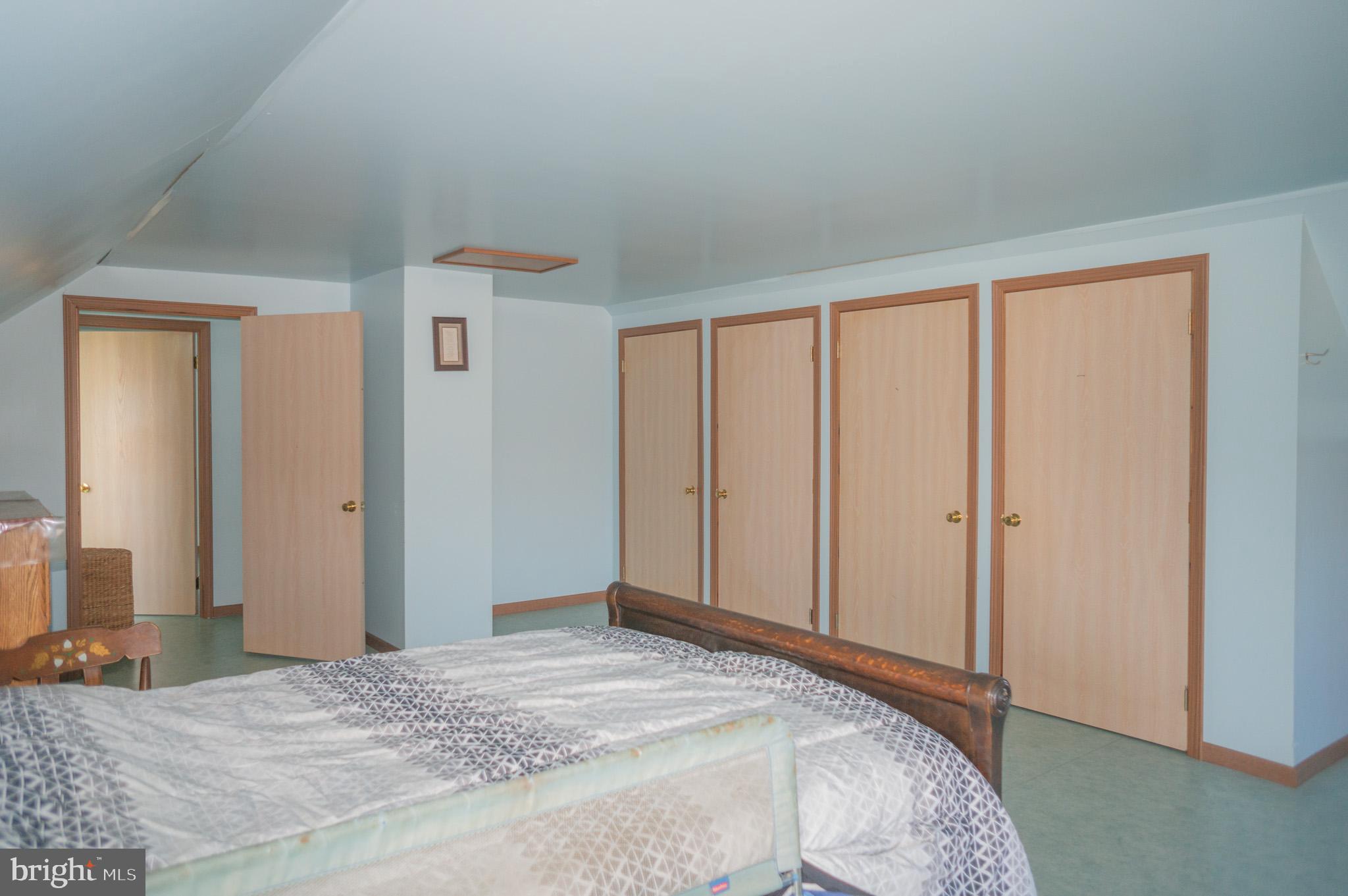 788 Buck Road New Providence, PA 17560 - Photo 31 of 70 a bedroom with a bed and a dresser