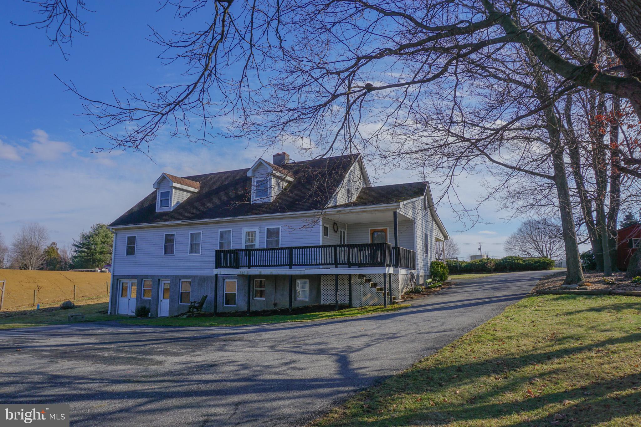 788 Buck Road New Providence, PA 17560 - Photo 43 of 70 a view of a big house with wooden fence