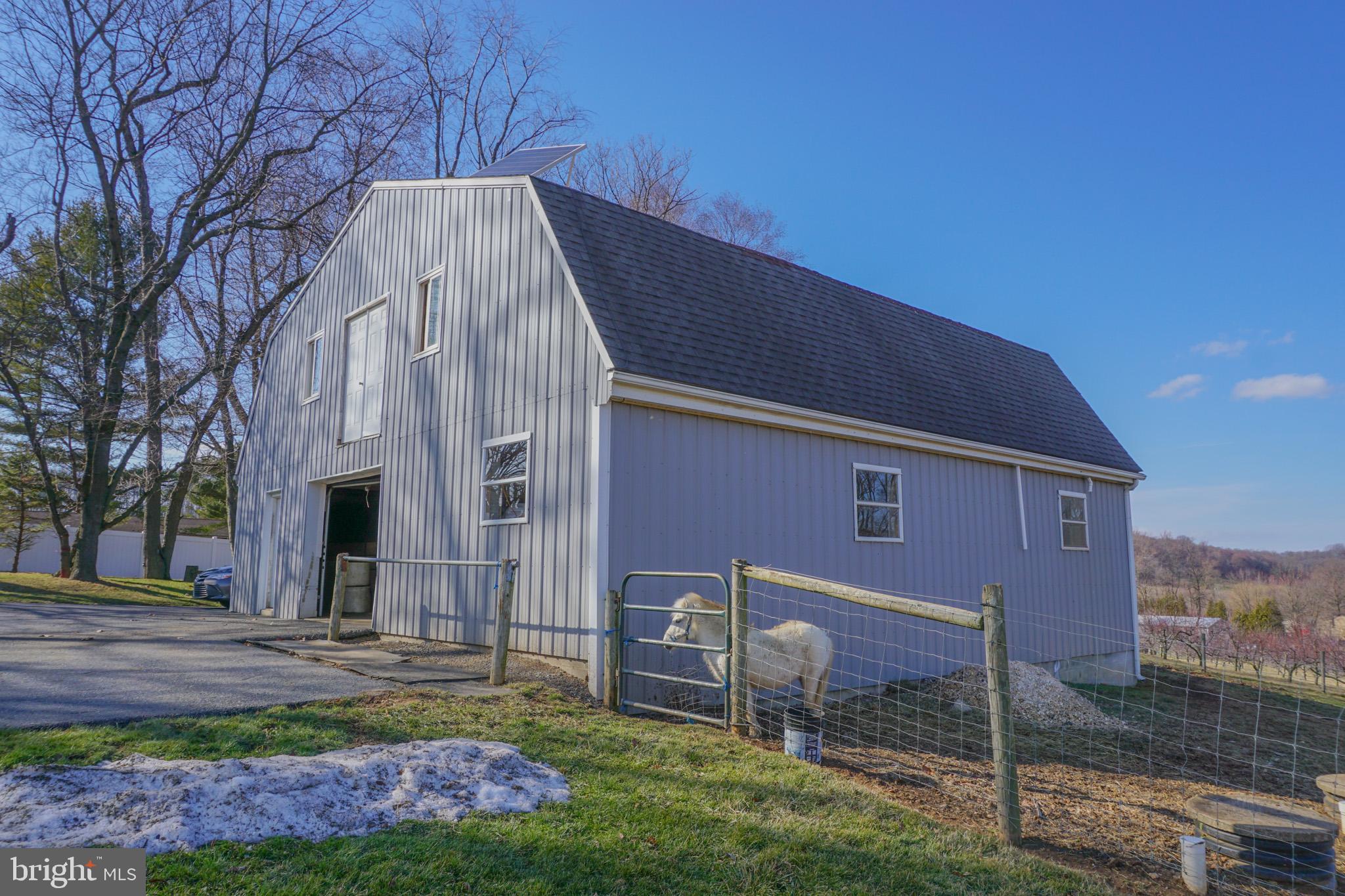 788 Buck Road New Providence, PA 17560 - Photo 53 of 70 a backyard of a house with lots of green space and fountain