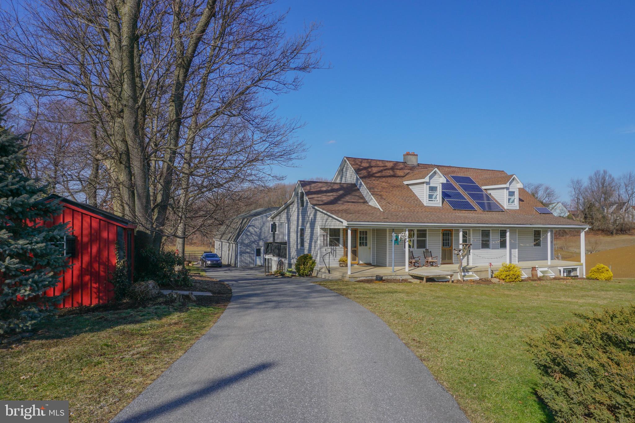 788 Buck Road New Providence, PA 17560 - Photo 68 of 70 a front view of a house with garden