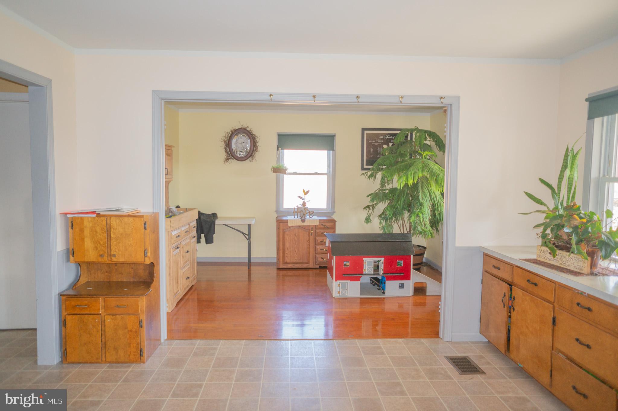 788 Buck Road New Providence, PA 17560 - Photo 10 of 70 a living room with furniture and a potted plant