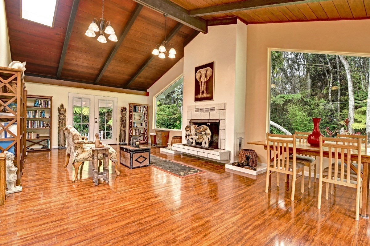 19-4089 Wright Road Volcano, HI 96785 - Photo 14 of 30 a living room with furniture and a fireplace