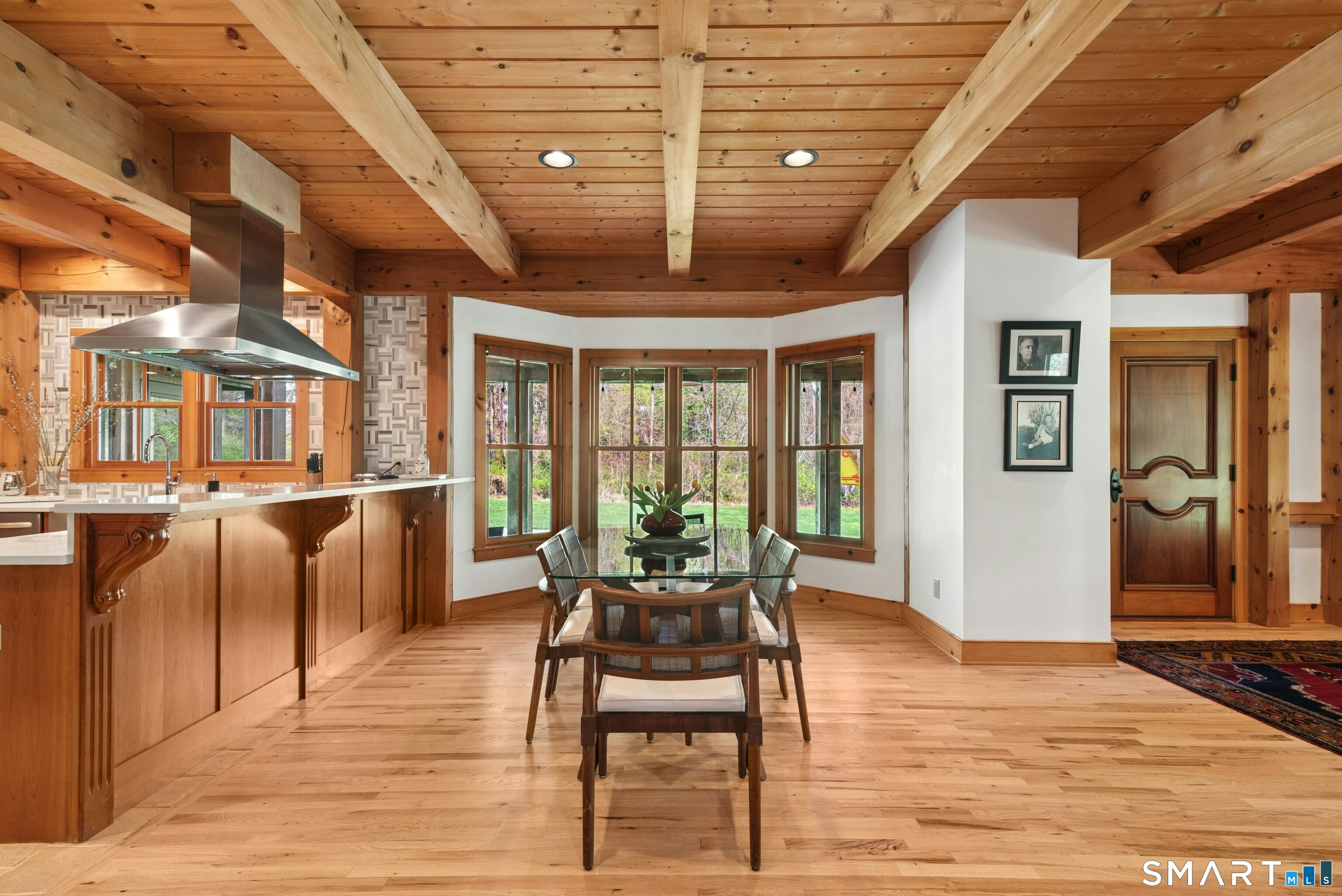 15 Silversmith Lane Redding, CT 06896 - Photo 11 of 36 Dining Room. Beams, bay window overlooking the front landscape and open to the kitchen and living room for an ideal entertaining flow.