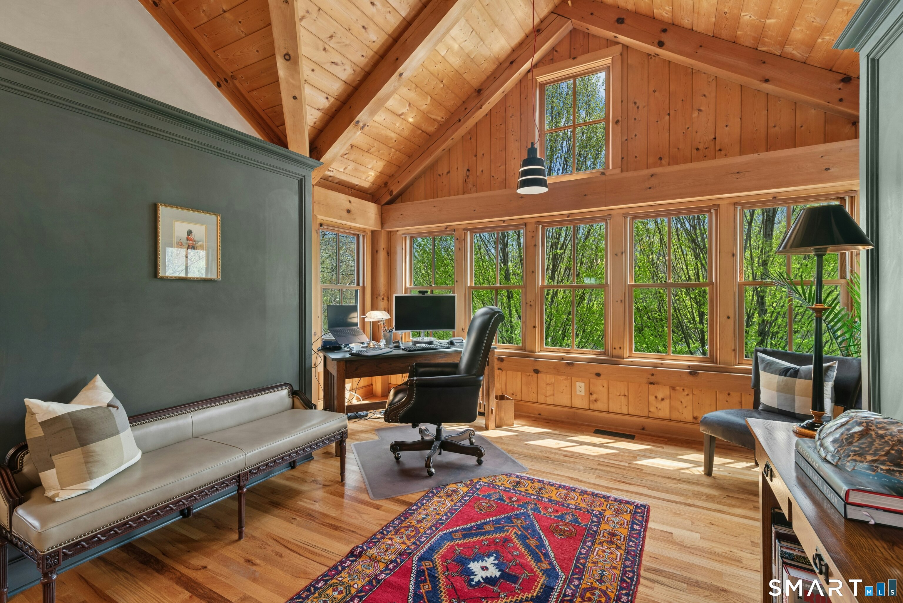 15 Silversmith Lane Redding, CT 06896 - Photo 23 of 36 The office/study. Vaulted ceiling, fabulous flexible-use space with breathtaking views of the pond and grounds.
