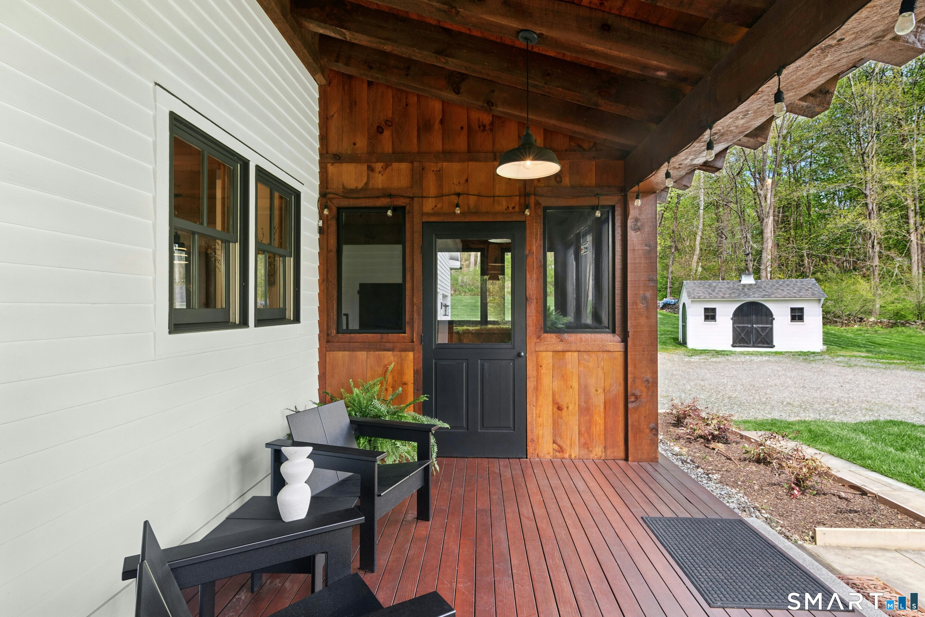 15 Silversmith Lane Redding, CT 06896 - Photo 28 of 36 The lovely screened in porch, one of two "mud" entrances to the home from the outside.