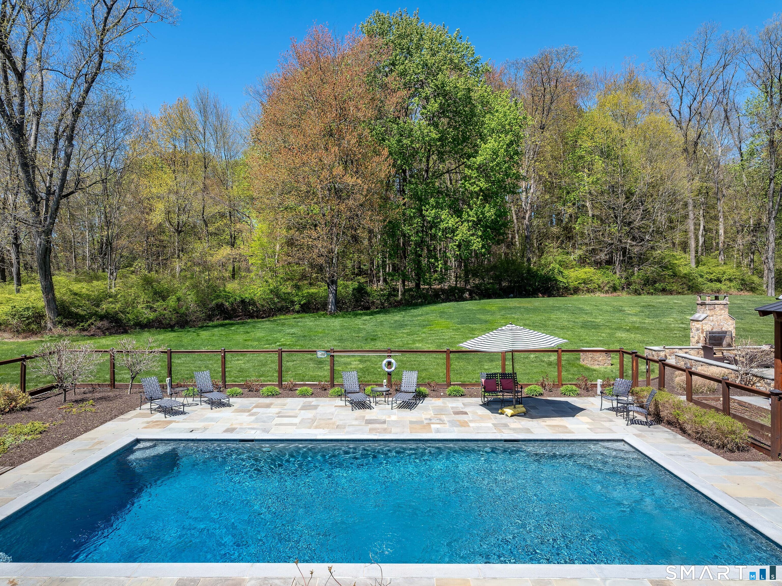15 Silversmith Lane Redding, CT 06896 - Photo 3 of 36 Sparkling Gunite salt-water pool.