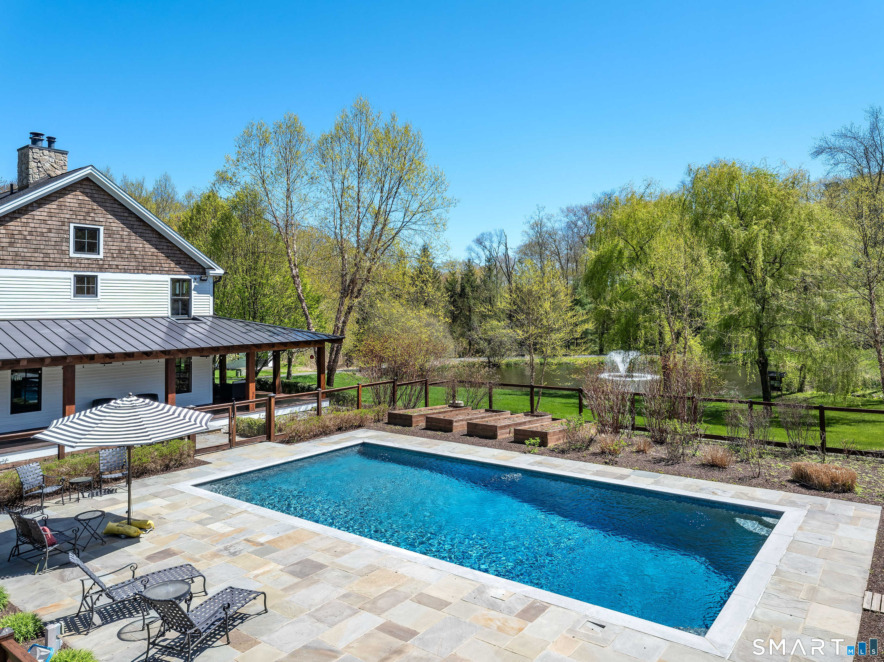 15 Silversmith Lane Redding, CT 06896 - Photo 4 of 36 Early Spring. Lush planting beds and gardens, ready to pop!