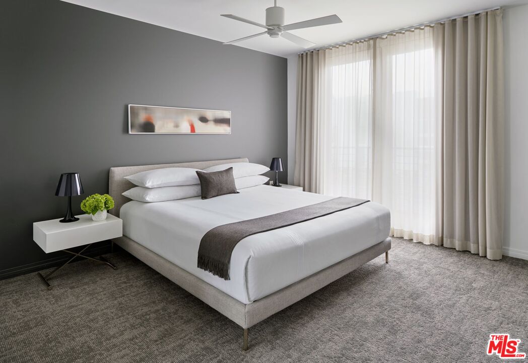 155 North Crescent Drive, Unit 1BRPR Beverly Hills, CA 90210 - Photo 6 of 10 a bedroom with a bed and a window