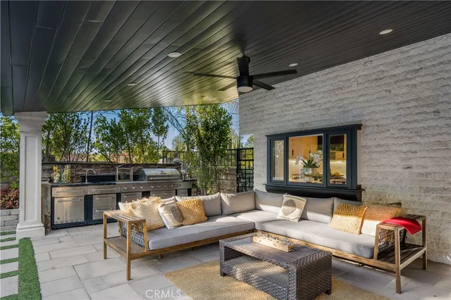 a outdoor living space with furniture and garden view