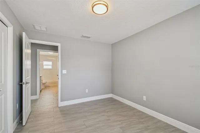 a bathroom with a toilet a sink and a shower