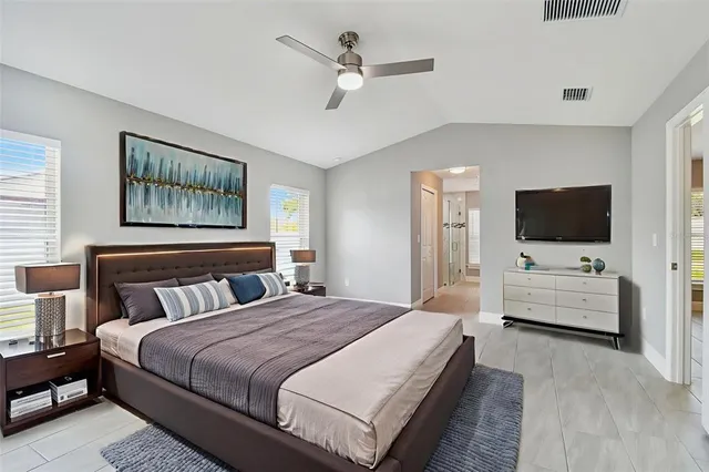 a view of a workspace with furniture and a potted plant