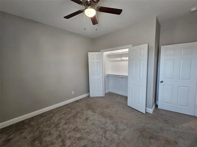 a bathroom with a sink double vanity and a mirror