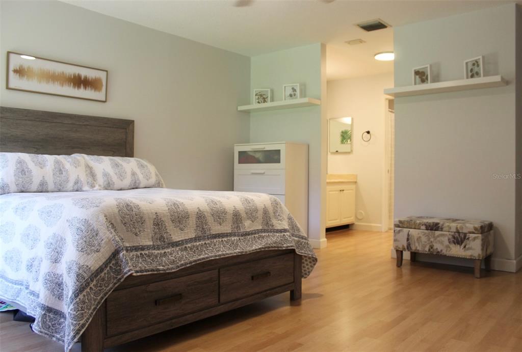 22383 Thousand Pines Lane Boca Raton, FL 33428 - Photo 11 of 28 a bedroom with a bed and a couch