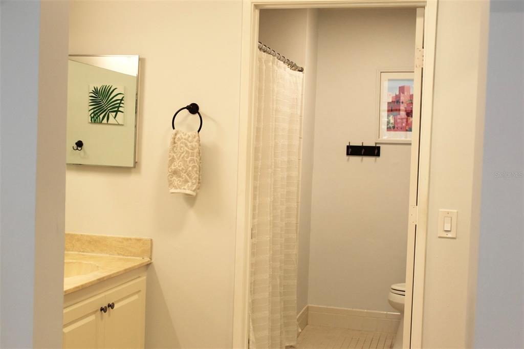 22383 Thousand Pines Lane Boca Raton, FL 33428 - Photo 16 of 29 a bathroom with a shower