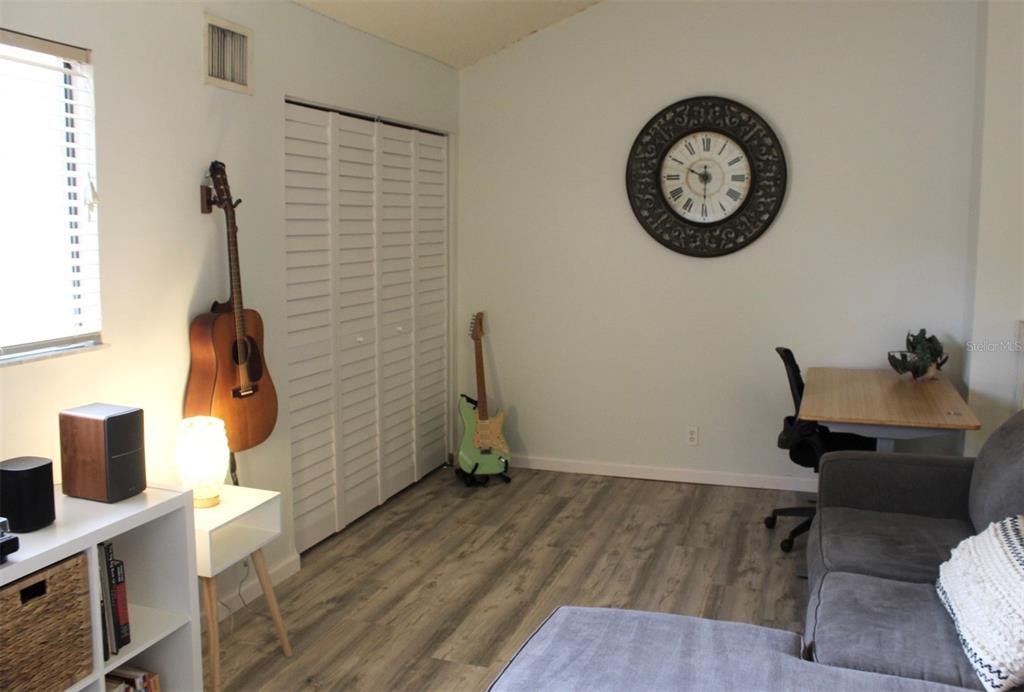 22383 Thousand Pines Lane Boca Raton, FL 33428 - Photo 20 of 29 a view of a workspace with furniture and wooden floor