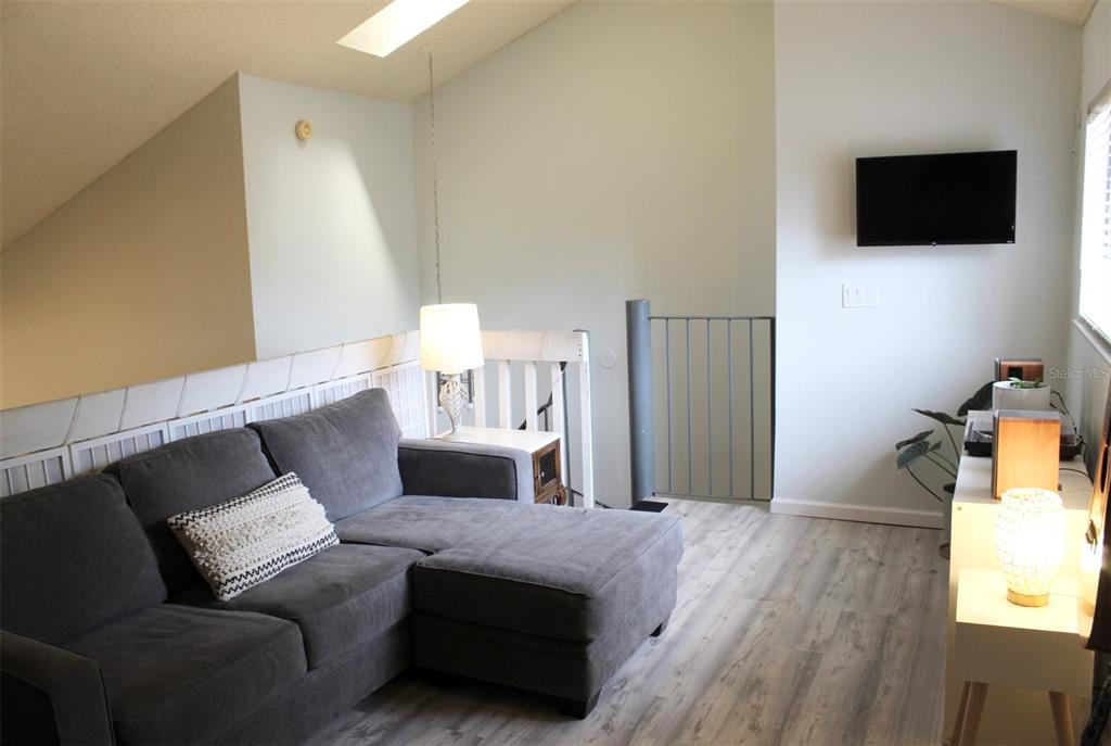 22383 Thousand Pines Lane Boca Raton, FL 33428 - Photo 21 of 29 a living room with furniture and a flat screen tv