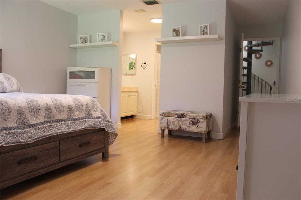 22383 Thousand Pines Lane Boca Raton, FL 33428 - Photo 10 of 28 a bedroom with furniture and a dresser