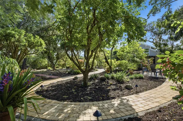 a view of a chairs and tables in the patio