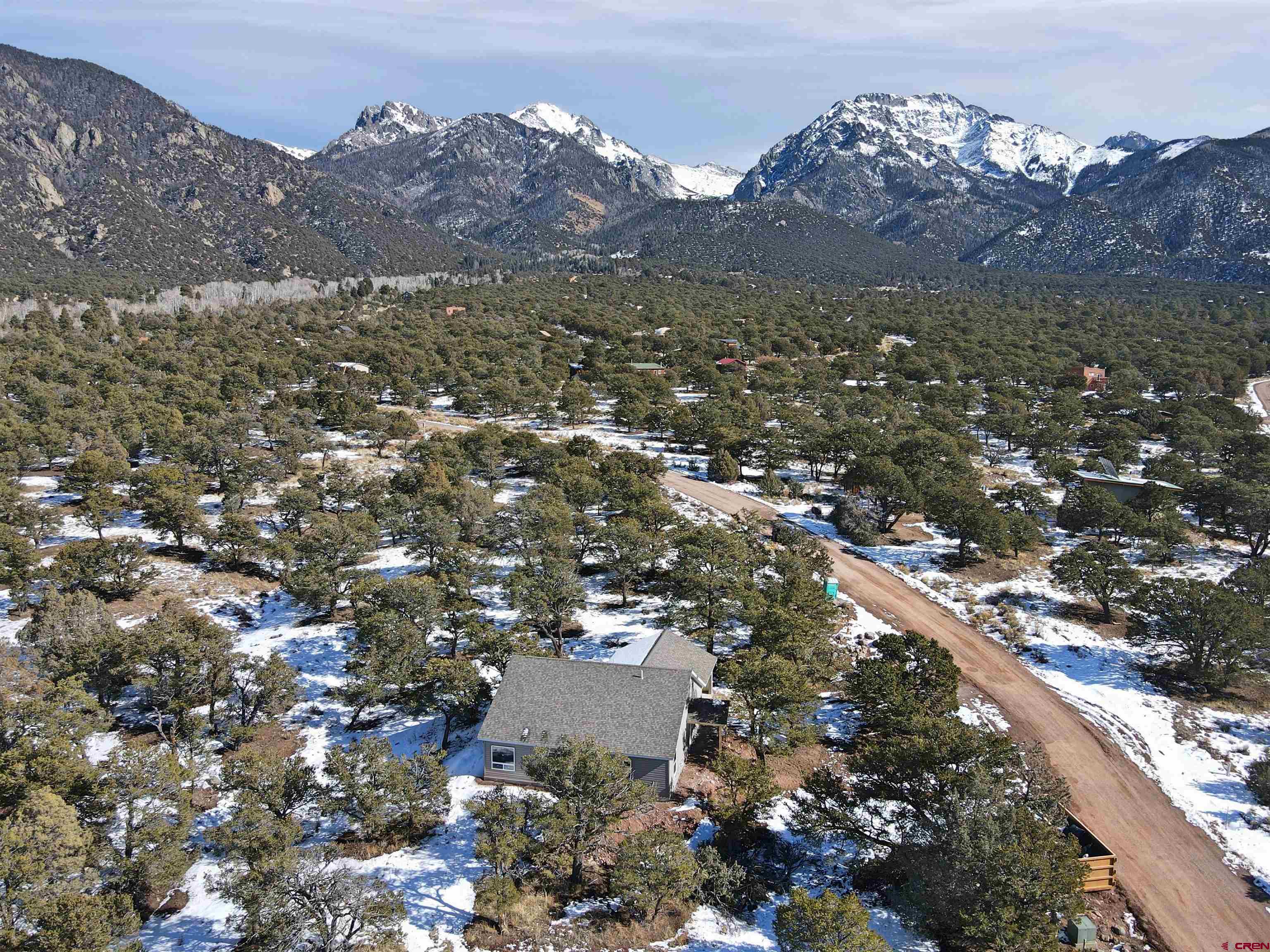 216 Baca Grant Way Crestone, CO 81131 - Photo 13 of 17 an aerial view of residential houses with outdoor space and trees