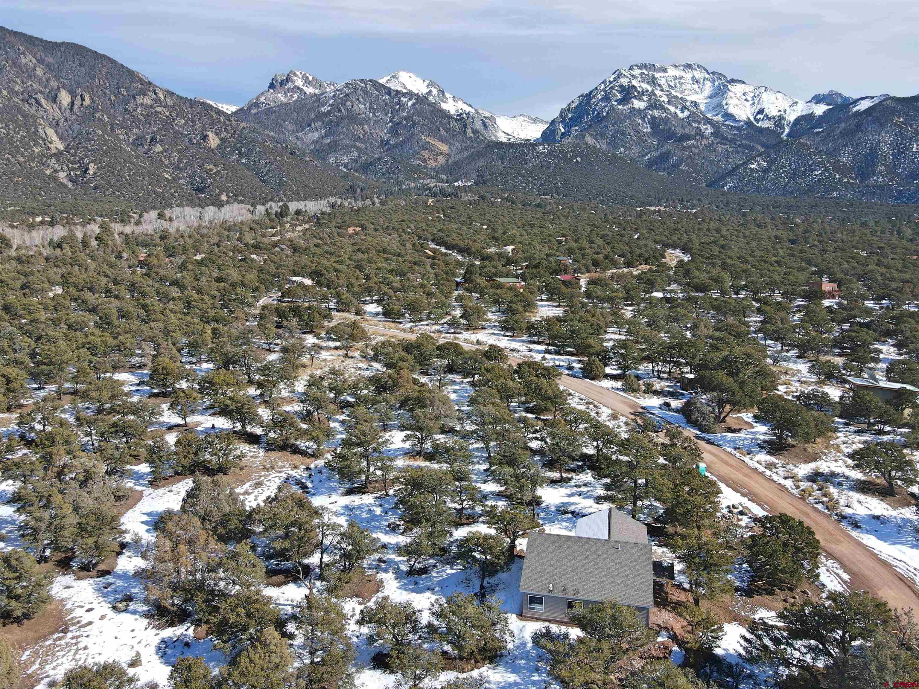 216 Baca Grant Way Crestone, CO 81131 - Photo 15 of 17 an aerial view of house with yard and mountain view in back