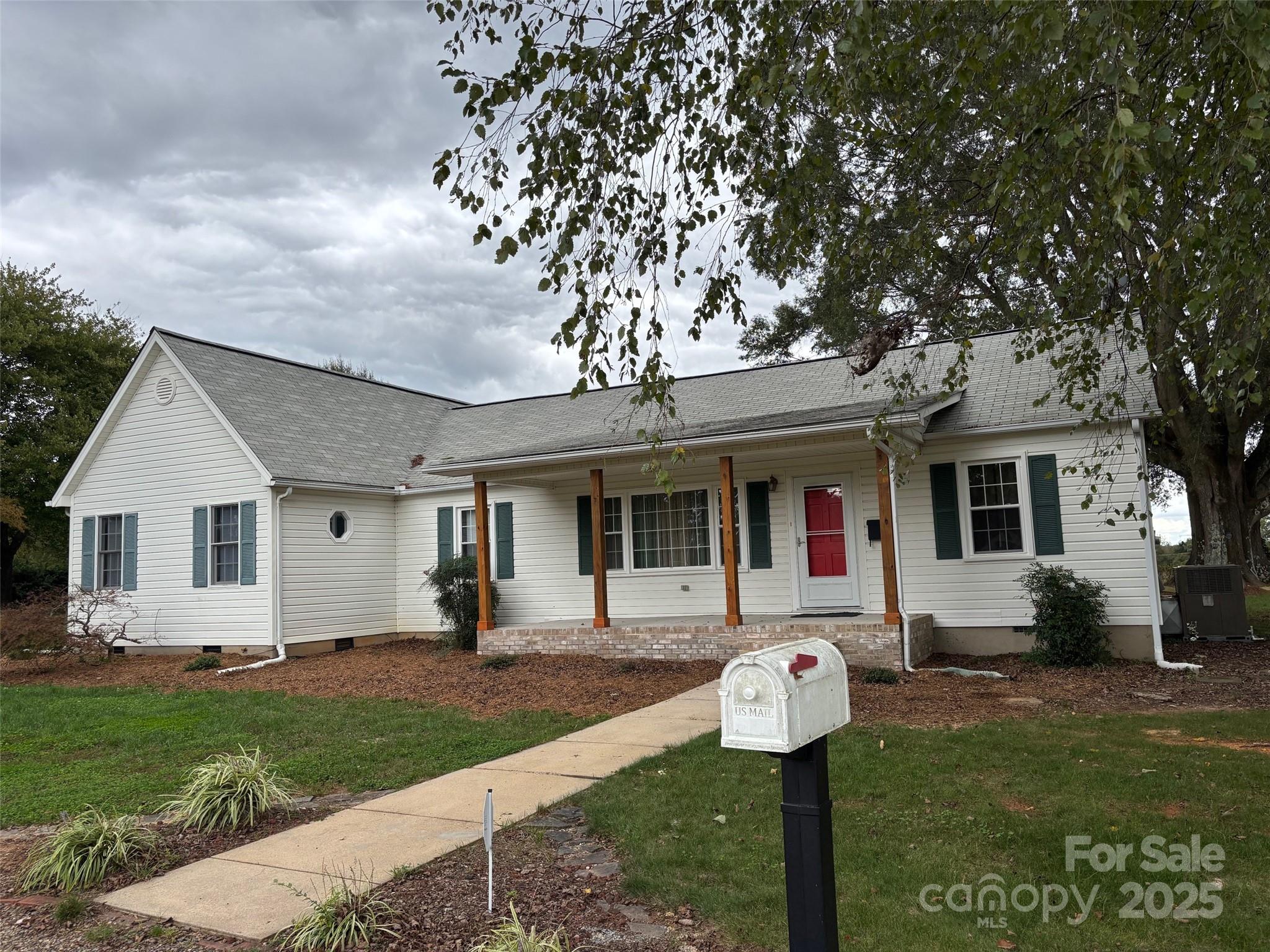 407 State Park Road Troutman, NC 28166 - Photo 12 of 21 a front view of house with yard