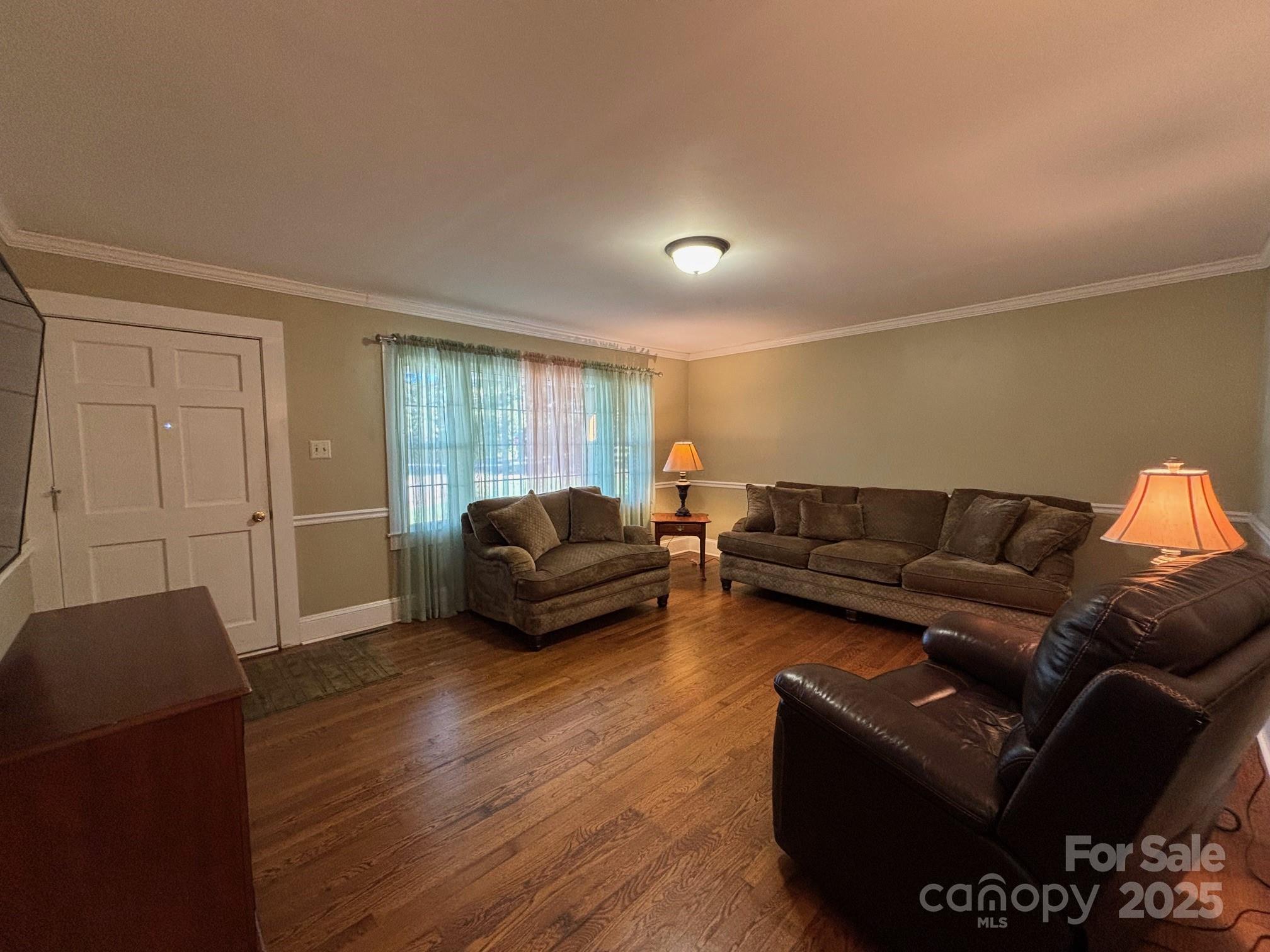 407 State Park Road Troutman, NC 28166 - Photo 7 of 21 a living room with furniture and a window