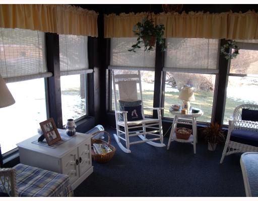 15 Wilson Road Middletown, RI 02842 - Photo 11 of 12 Other. Partial view of the three season room at the back of the house.