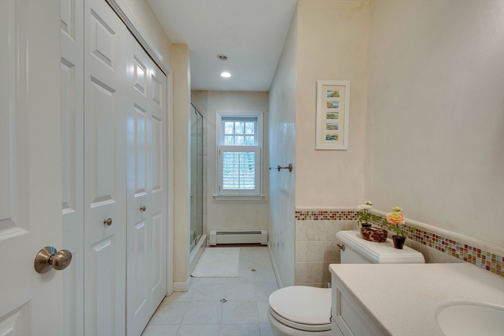 48 Miller Hill Road Dover, MA 02030 - Photo 16 of 26 a bathroom with a toilet sink and shower