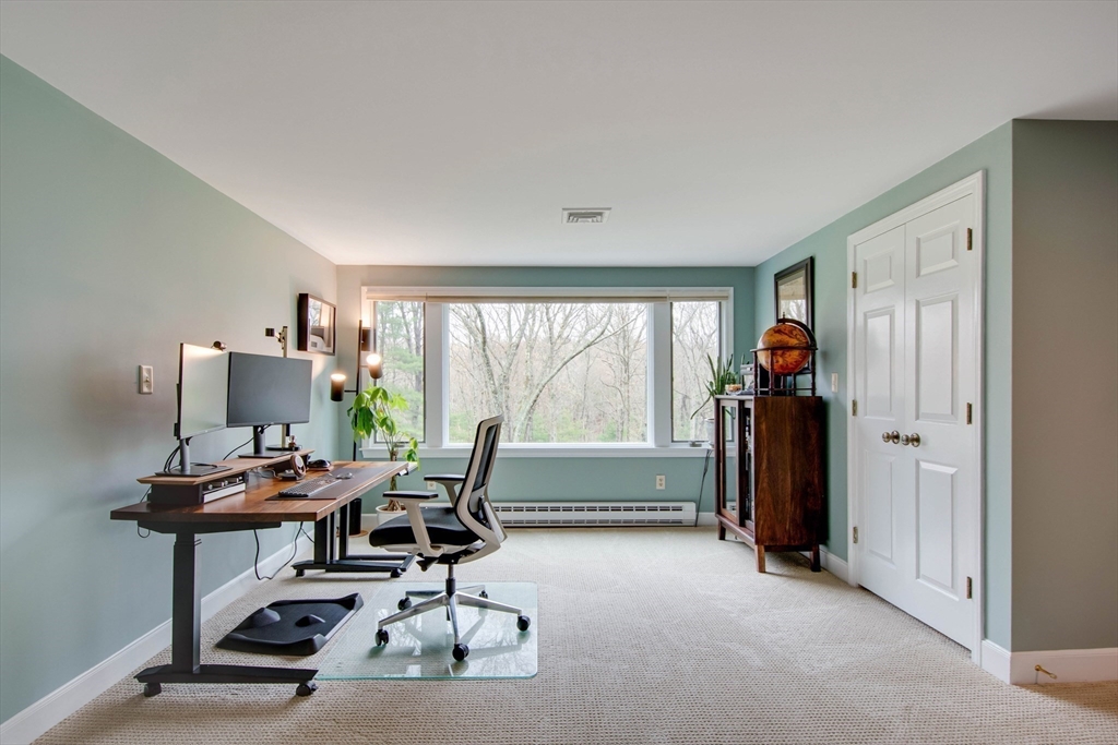 48 Miller Hill Road Dover, MA 02030 - Photo 20 of 26 a workspace with furniture and a window