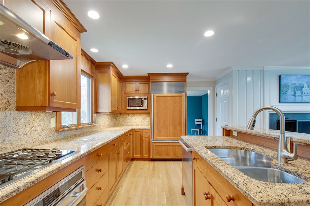 48 Miller Hill Road Dover, MA 02030 - Photo 2 of 26 a kitchen with granite countertop a sink and cabinets