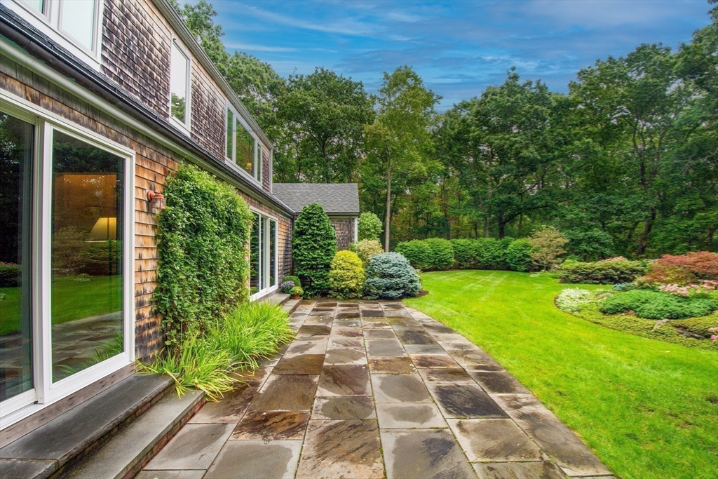 48 Miller Hill Road Dover, MA 02030 - Photo 22 of 26 a view of a garden with pathway