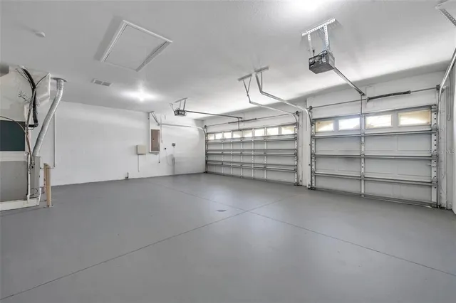 a view of a room with storage and utility room