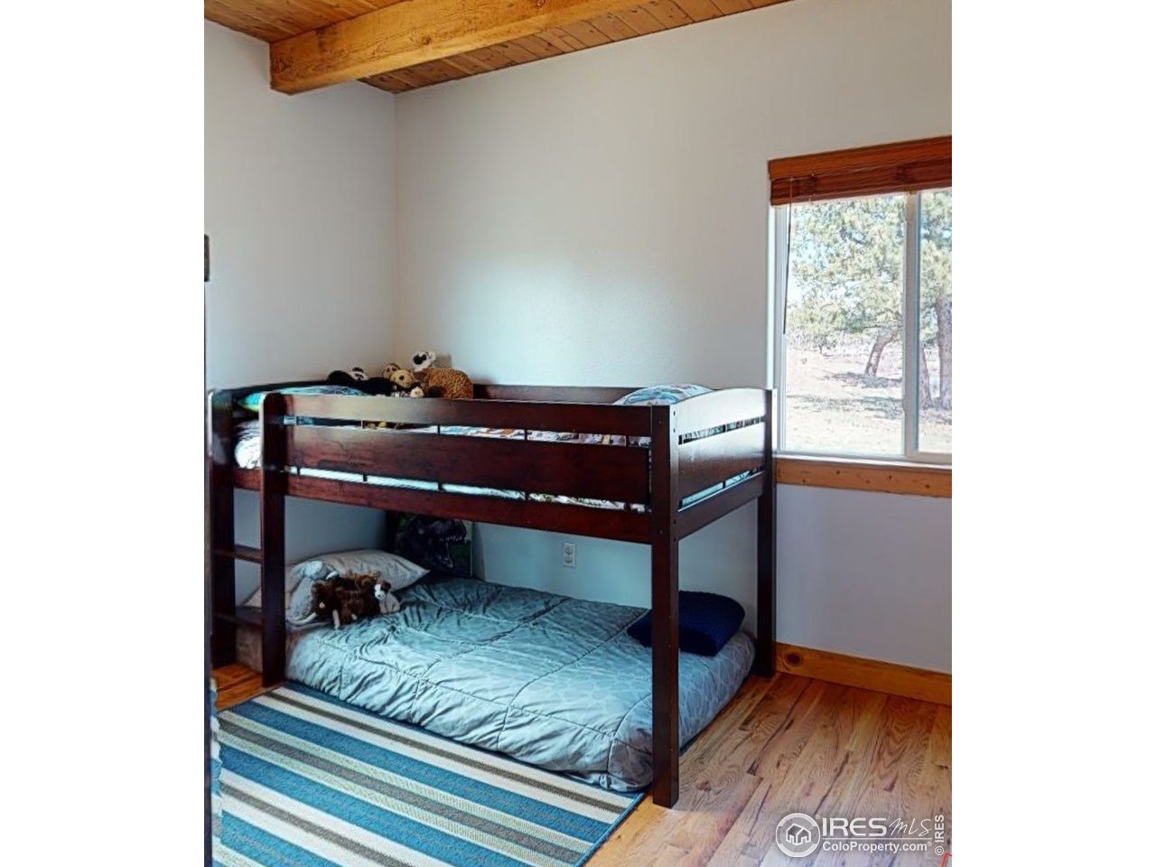 1925 Old Ranch Road Livermore, CO 80536 - Photo 16 of 40 2nd bedroom with half bath.