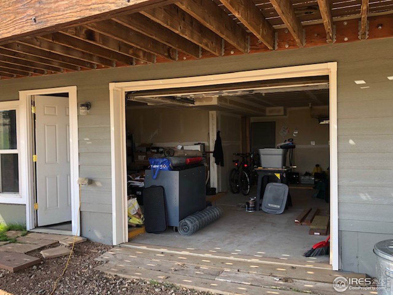 1925 Old Ranch Road Livermore, CO 80536 - Photo 22 of 40 Garage and workspace under home.