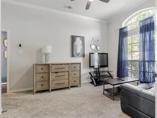 a room with furniture and window