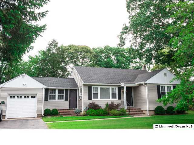 280 Sudbury Road Point Pleasant, NJ 08742 - Photo 1 of 20 a aerial view of a white house with a yard and large trees