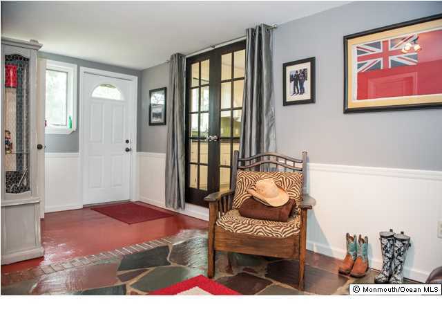 280 Sudbury Road Point Pleasant, NJ 08742 - Photo 13 of 20 a bedroom with a bed and dresser