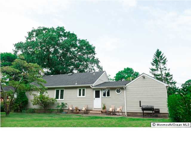280 Sudbury Road Point Pleasant, NJ 08742 - Photo 17 of 20 a view of a front of house with a yard