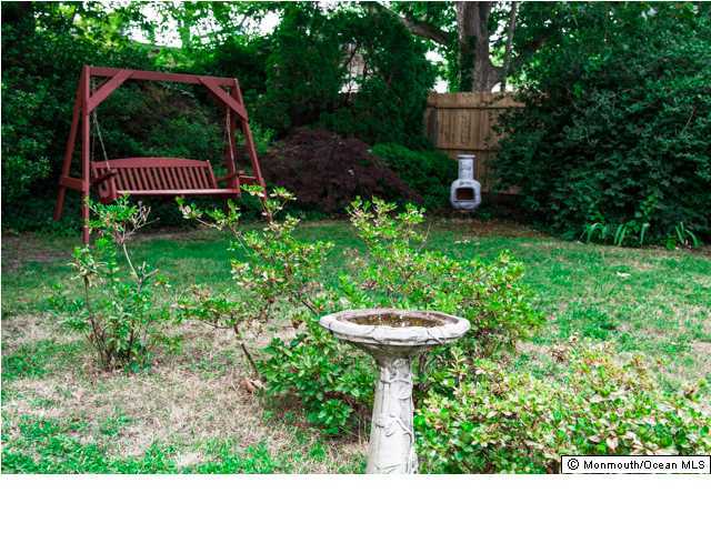 280 Sudbury Road Point Pleasant, NJ 08742 - Photo 20 of 20 a view of a garden with a house