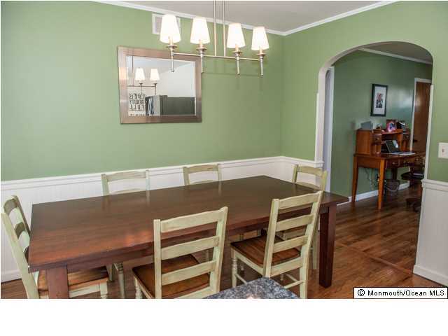 280 Sudbury Road Point Pleasant, NJ 08742 - Photo 7 of 20 a view of a dining room with furniture and wooden floor