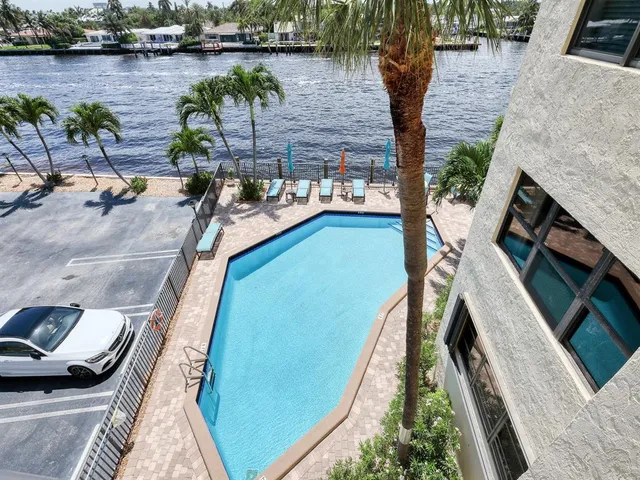 a living room with furniture and windows