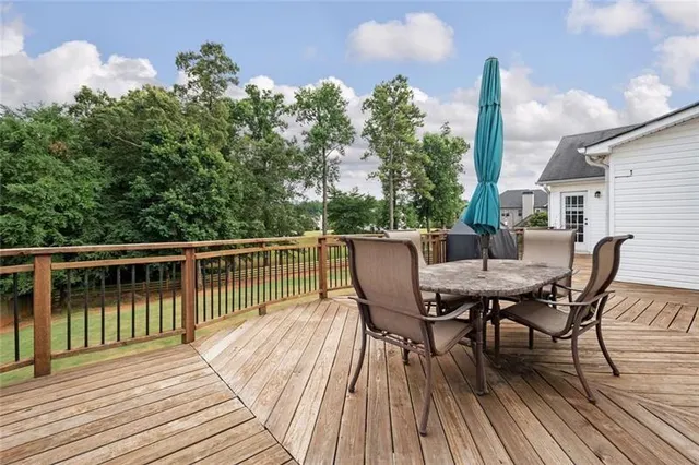a view of a deck patio and outdoor seating