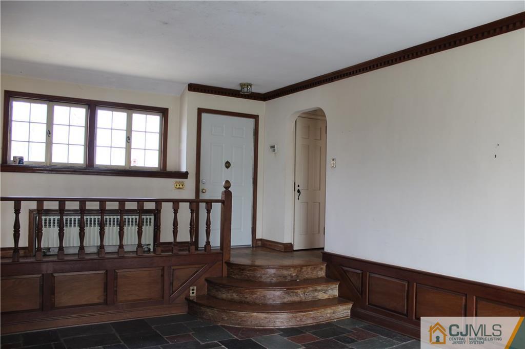 1 Edgebrook Road New Brunswick, NJ 08901 - Photo 3 of 8 a view of entryway with stairs