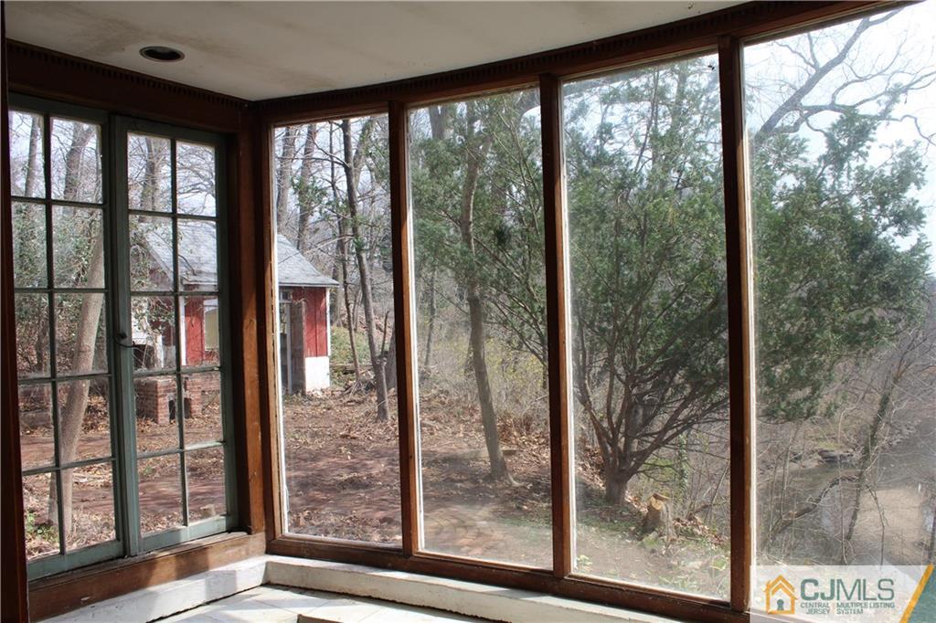 1 Edgebrook Road New Brunswick, NJ 08901 - Photo 4 of 8 a view of a room that has a large window